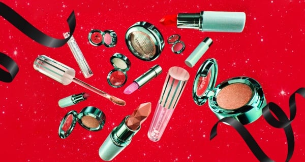 mac christmas colour collection on red background with ribbons