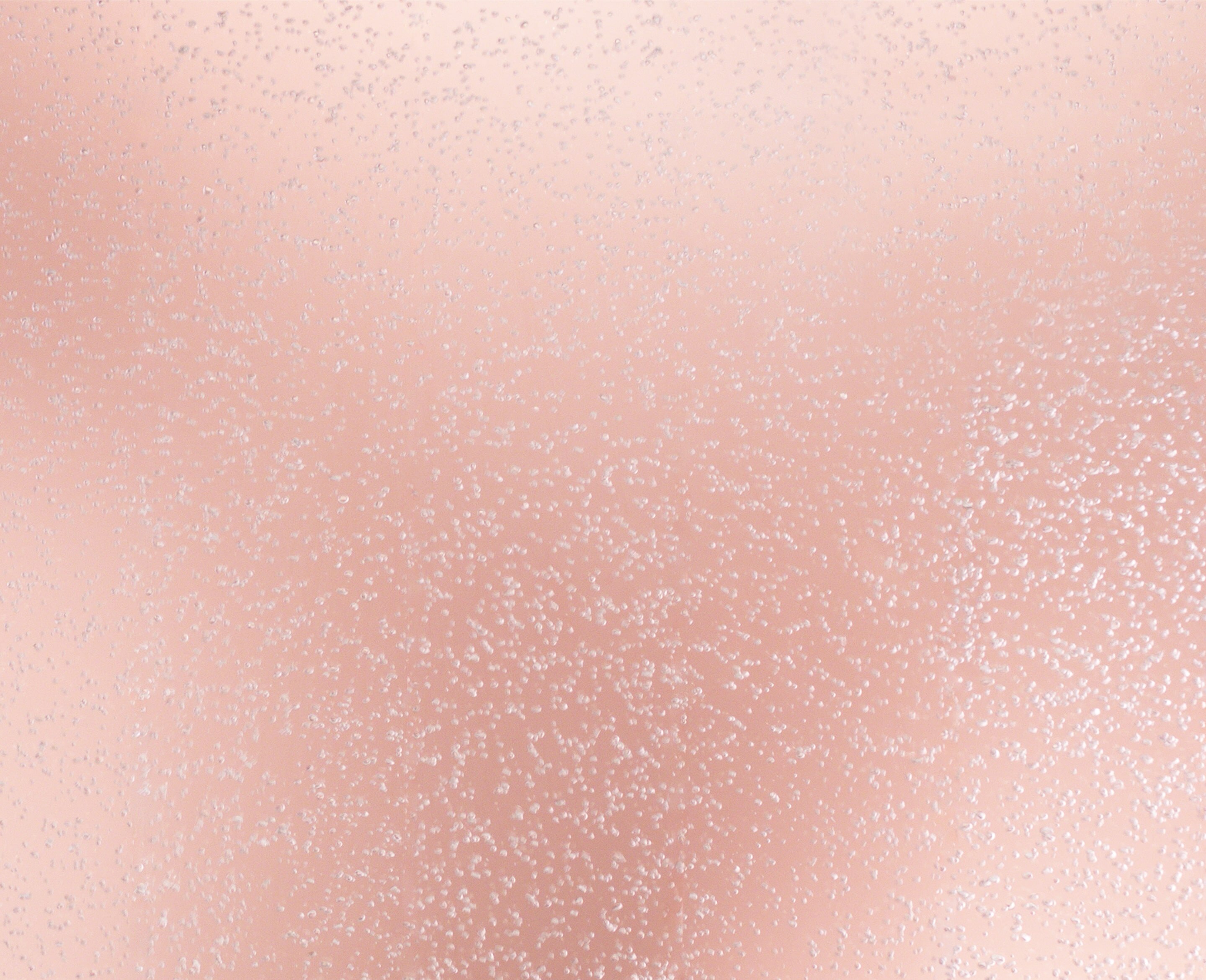 Background image containing bubbles over a soft pink background